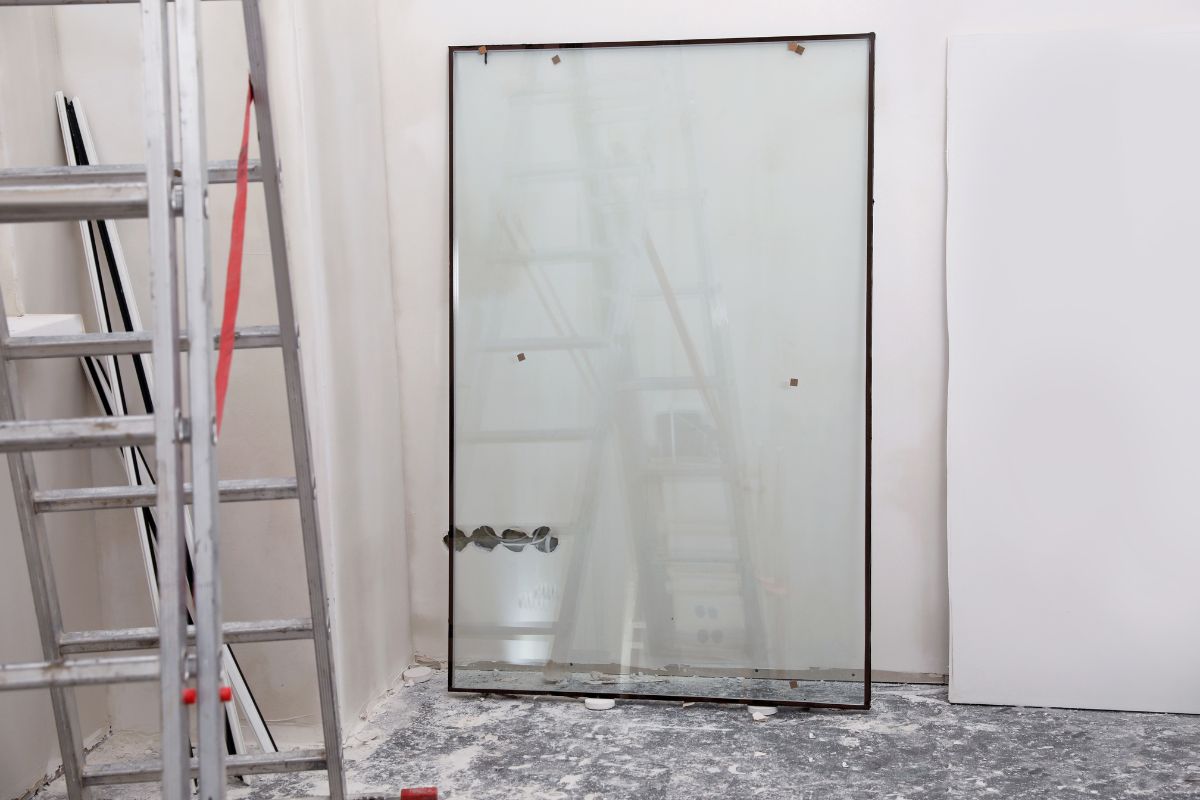 Glass panel replacement technician at work